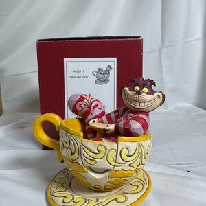 Jim Shore Disney Alice in Wonderland Cheshire Cat in Yellow Teacup Figurine